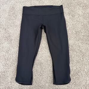 Lululemon Black Crop Leggings Sheer Black on Back Calves Zip Pocket Women 12